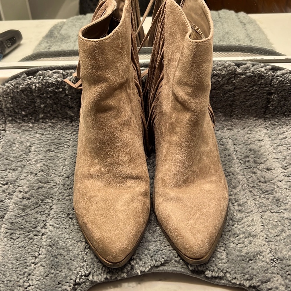 Candies fringed boots in size 9.  Minimal wear.  Small scuffs as seen in pic 4.